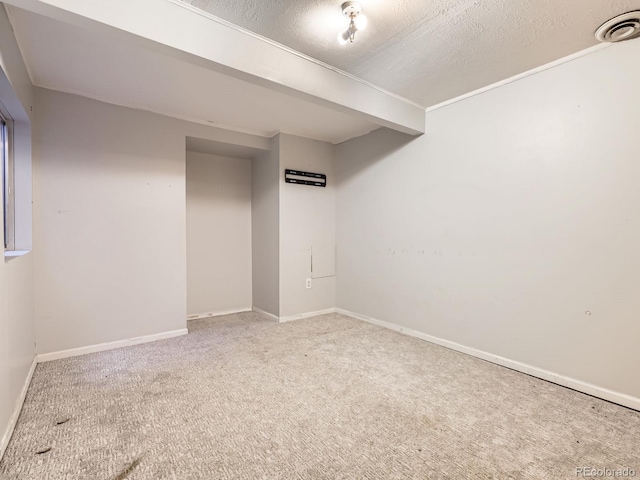 1990 S Helena St Unit H, Aurora, CO 80013 - finished below grade area featuring carpet floors and a textured ceiling