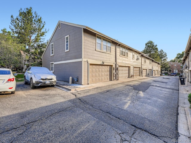 1990 S Helena St Unit H, Aurora, CO 80013 - view of side of property featuring community garages