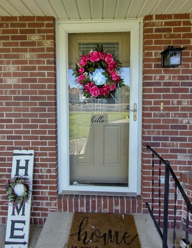 200 E 6th St, Flagler, CO 80815 - property entrance featuring brick siding