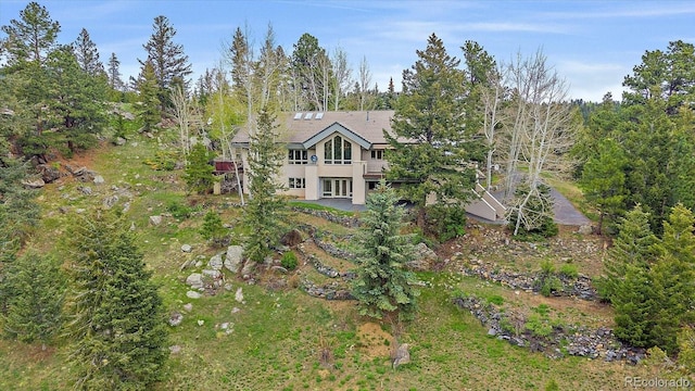 787 W Meadow Rd, Evergreen, CO 80439 - view of front of home with a deck and a patio