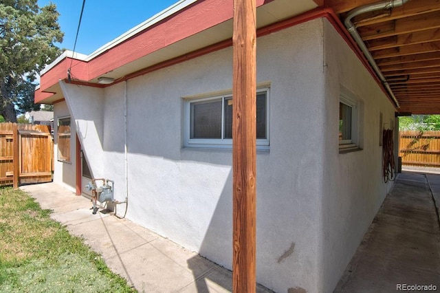 1560 Simms St, Lakewood, CO 80215 - view of home's exterior featuring stucco siding