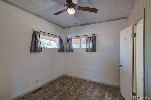 1560 Simms St, Lakewood, CO 80215 - carpeted empty room with crown molding, a ceiling fan, and baseboards