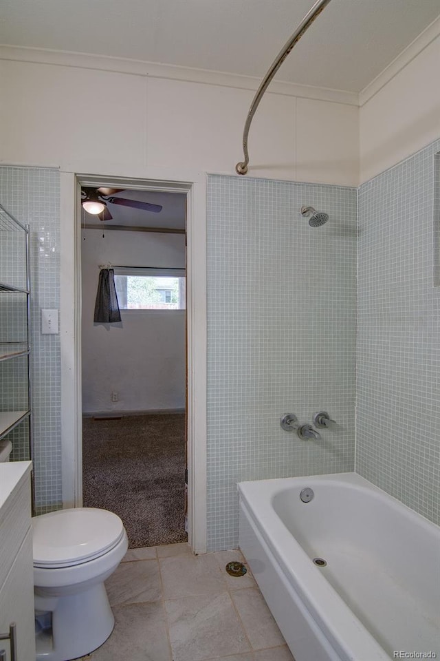 1560 Simms St, Lakewood, CO 80215 - full bathroom with tile patterned floors, toilet, and shower / tub combination