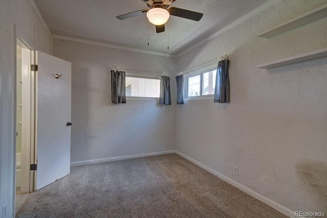 1560 Simms St, Lakewood, CO 80215 - unfurnished bedroom featuring crown molding, carpet flooring, a textured wall, ceiling fan, and baseboards