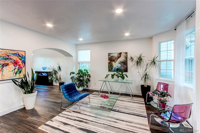 living area with hardwood / wood-style floors