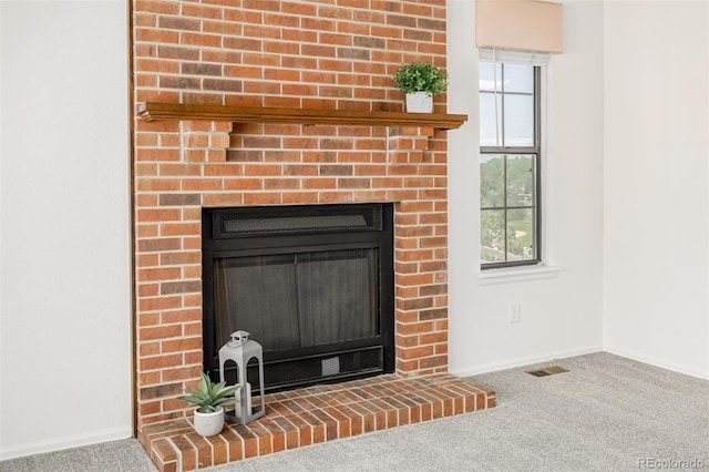 551 Snowy Owl Pl, Highlands Ranch, CO 80126 - detailed view of carpet flooring and a brick fireplace