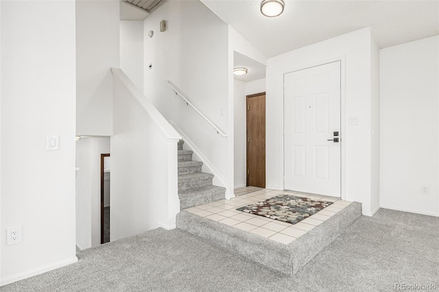 551 Snowy Owl Pl, Highlands Ranch, CO 80126 - foyer entrance featuring carpet
