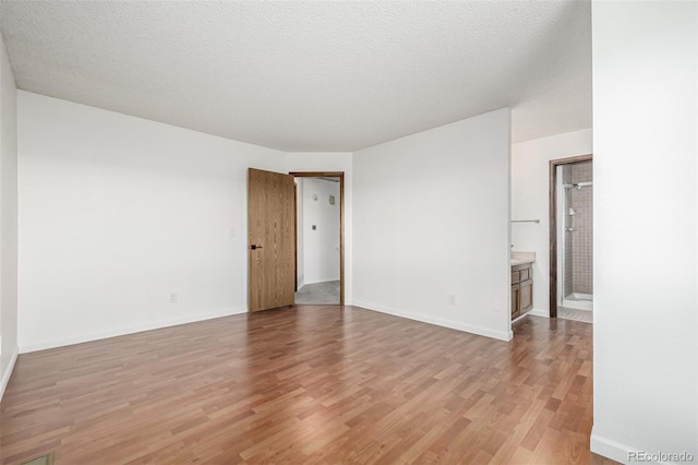 551 Snowy Owl Pl, Highlands Ranch, CO 80126 - empty room with light wood-style floors and baseboards