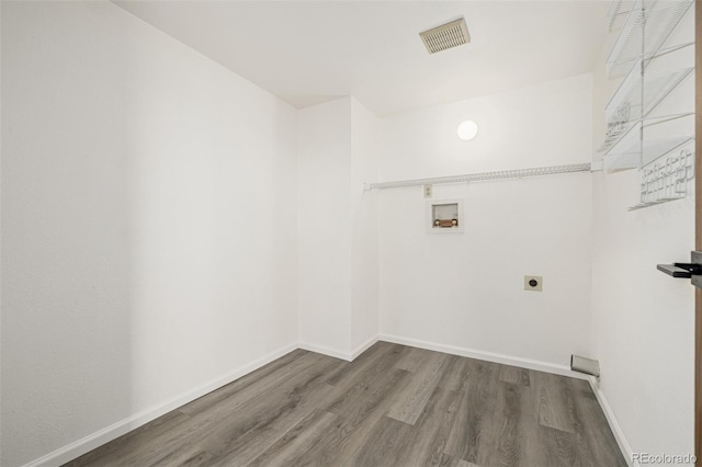 551 Snowy Owl Pl, Highlands Ranch, CO 80126 - washroom featuring electric dryer hookup, wood finished floors, and hookup for a washing machine