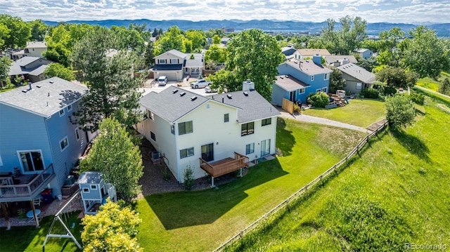 551 Snowy Owl Pl, Highlands Ranch, CO 80126 - aerial view of residential area with mountains