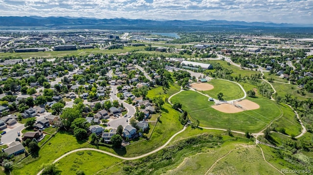 551 Snowy Owl Pl, Highlands Ranch, CO 80126 - aerial view of residential area featuring a mountainous background