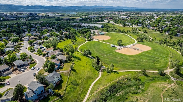 551 Snowy Owl Pl, Highlands Ranch, CO 80126 - aerial perspective of suburban area with a mountainous background