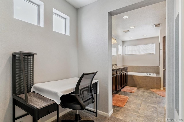 office featuring visible vents and baseboards