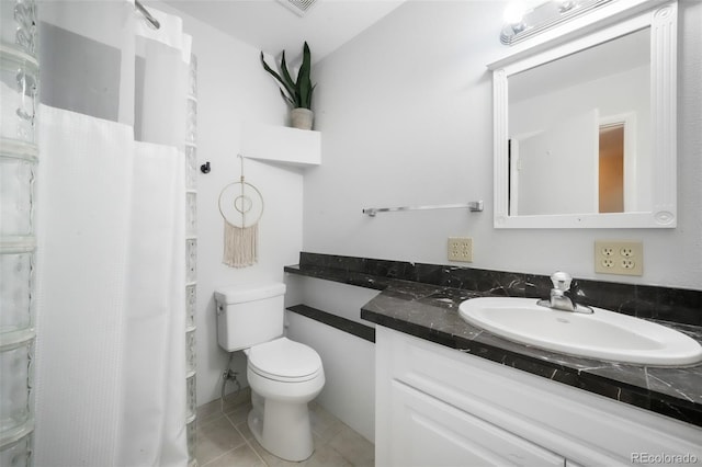 bathroom with toilet, tile patterned flooring, vanity, and a shower with curtain