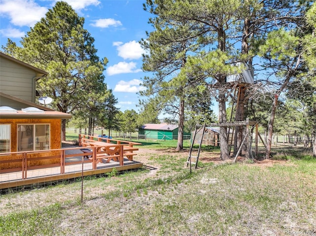 view of yard featuring a deck