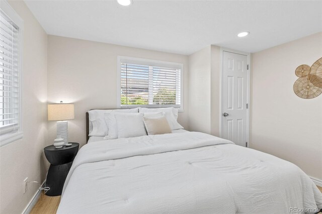 1130 Orchard St, Golden, CO 80401 - bedroom with baseboards, wood finished floors, and recessed lighting