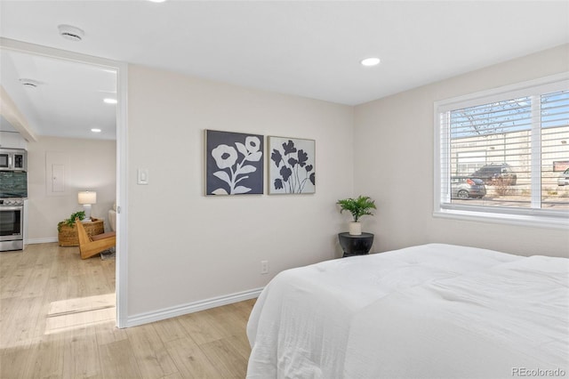 1130 Orchard St, Golden, CO 80401 - bedroom with light wood-type flooring, baseboards, and recessed lighting
