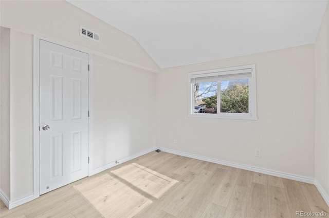 1130 Orchard St, Golden, CO 80401 - unfurnished room featuring light wood-style floors, vaulted ceiling, and baseboards