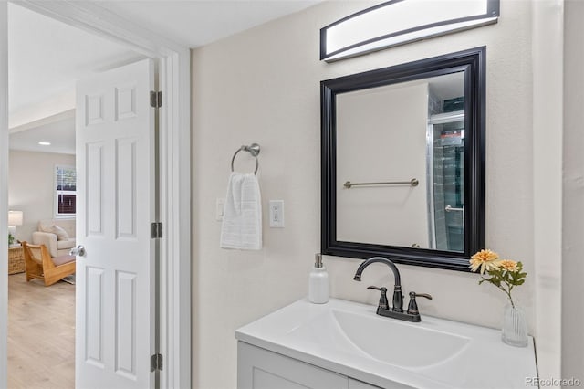 1130 Orchard St, Golden, CO 80401 - bathroom with vanity and wood finished floors