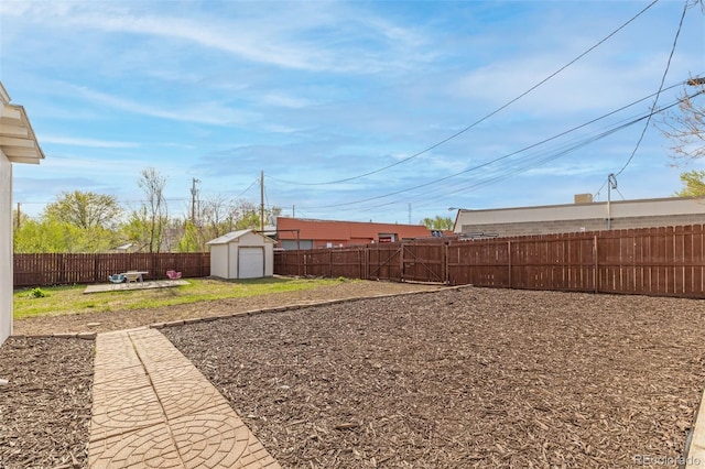 1130 Orchard St, Golden, CO 80401 - fenced backyard with a shed and an outbuilding