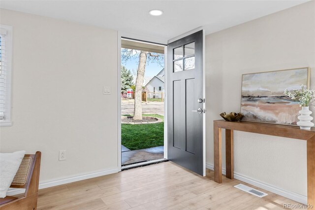 1130 Orchard St, Golden, CO 80401 - entrance foyer with recessed lighting, baseboards, visible vents, and wood finished floors
