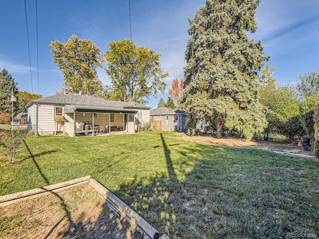 view of yard with a patio area