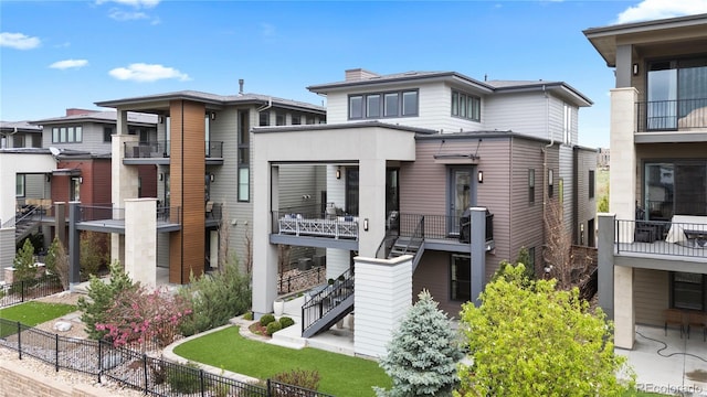10113 Bellwether Ln, Lone Tree, CO 80124 - view of front of house featuring fence and stairway