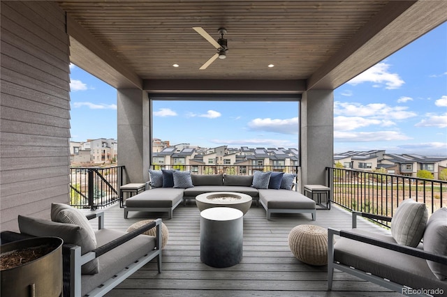 10113 Bellwether Ln, Lone Tree, CO 80124 - wooden deck featuring a ceiling fan, a residential view, and an outdoor living space with a fire pit