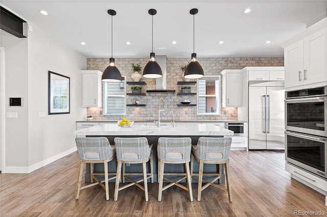 10113 Bellwether Ln, Lone Tree, CO 80124 - kitchen with backsplash, open shelves, appliances with stainless steel finishes, and a sink