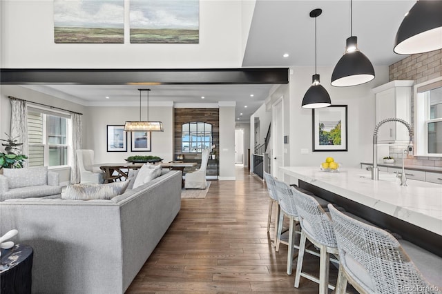10113 Bellwether Ln, Lone Tree, CO 80124 - living room with dark wood-style flooring, recessed lighting, and plenty of natural light