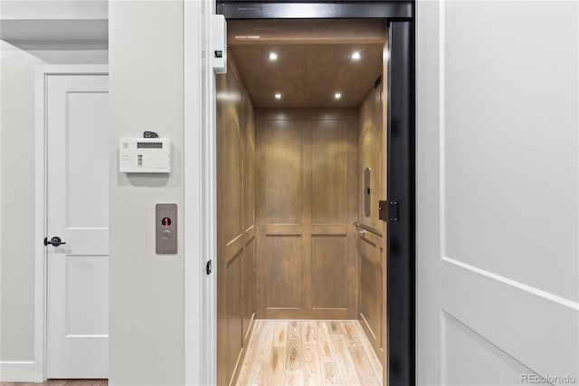 10113 Bellwether Ln, Lone Tree, CO 80124 - interior details featuring recessed lighting, elevator, and wood finished floors