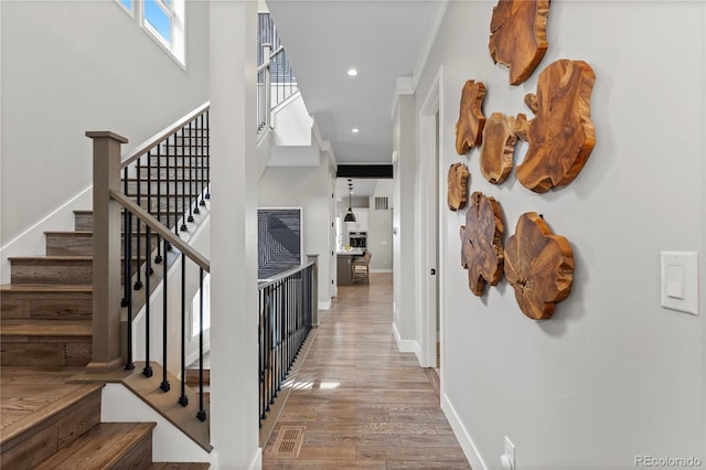 10113 Bellwether Ln, Lone Tree, CO 80124 - interior space featuring recessed lighting, baseboards, wood finished floors, visible vents, and stairway