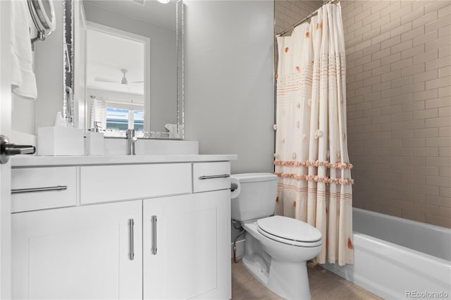 10113 Bellwether Ln, Lone Tree, CO 80124 - bathroom featuring toilet, shower / bath combination with curtain, wood finished floors, and vanity