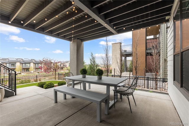 10113 Bellwether Ln, Lone Tree, CO 80124 - view of patio / terrace featuring fence, a residential view, and outdoor dining area