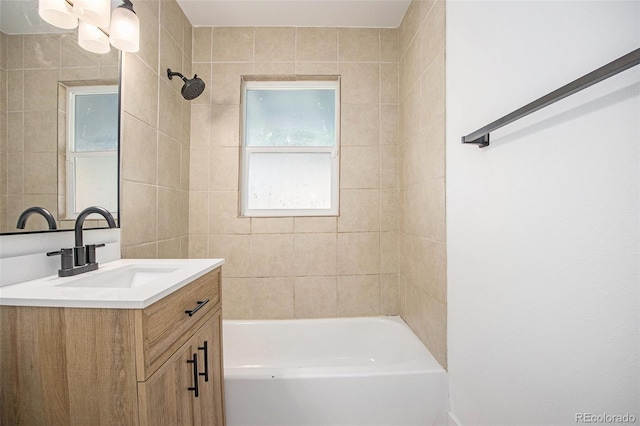 bathroom with vanity and  shower combination