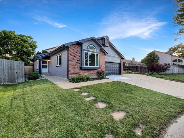 12375 Ivy Pl, Brighton, CO 80602 - ranch-style house with brick siding, concrete driveway, and a garage