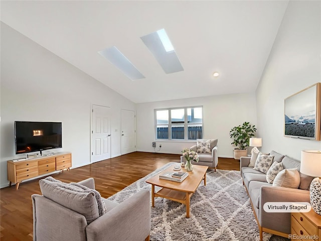 12375 Ivy Pl, Brighton, CO 80602 - living area featuring a skylight, wood finished floors, and high vaulted ceiling