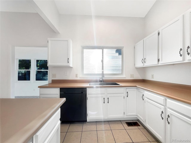 12375 Ivy Pl, Brighton, CO 80602 - kitchen featuring black dishwasher, white cabinets, light tile patterned floors, and light countertops