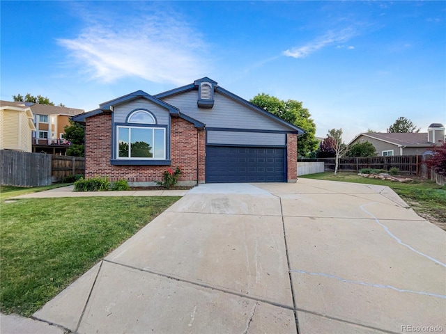 12375 Ivy Pl, Brighton, CO 80602 - ranch-style house with brick siding, driveway, and an attached garage