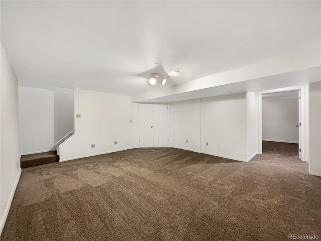 12375 Ivy Pl, Brighton, CO 80602 - empty room featuring dark colored carpet and baseboards