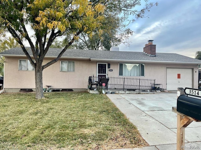 single story home featuring a garage and a front yard