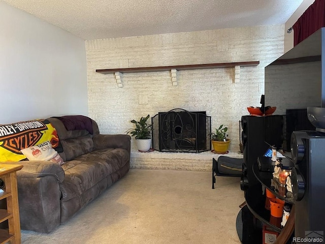 living room featuring light carpet, a fireplace, and a textured ceiling