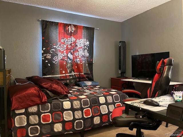 carpeted bedroom with a textured ceiling