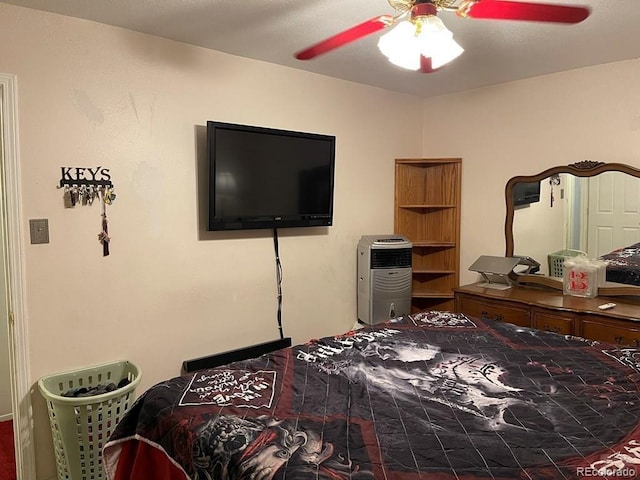 bedroom featuring ceiling fan