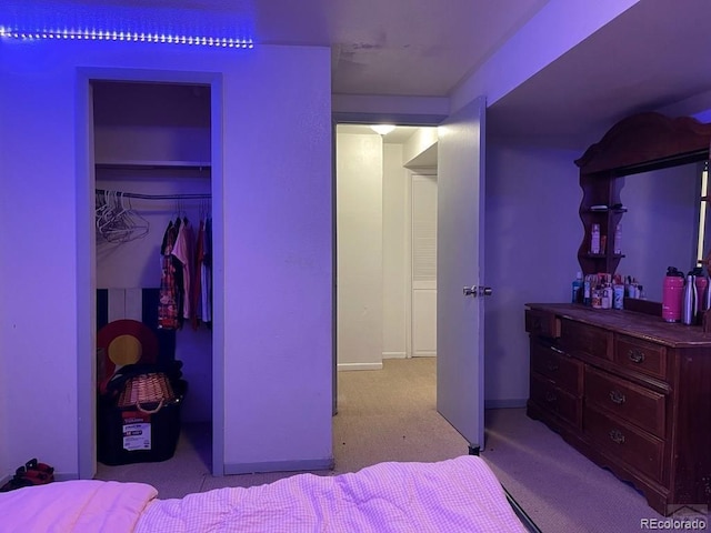 carpeted bedroom featuring a closet