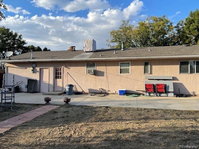 rear view of house featuring a patio area