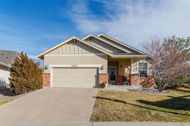 craftsman-style home with a garage and a front yard