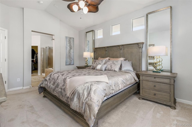 carpeted bedroom featuring ceiling fan and vaulted ceiling