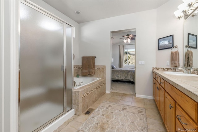 bathroom featuring vanity, tile patterned floors, ceiling fan, and separate shower and tub