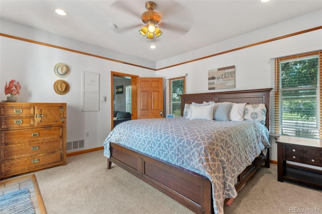 bedroom with recessed lighting, baseboards, visible vents, and light colored carpet